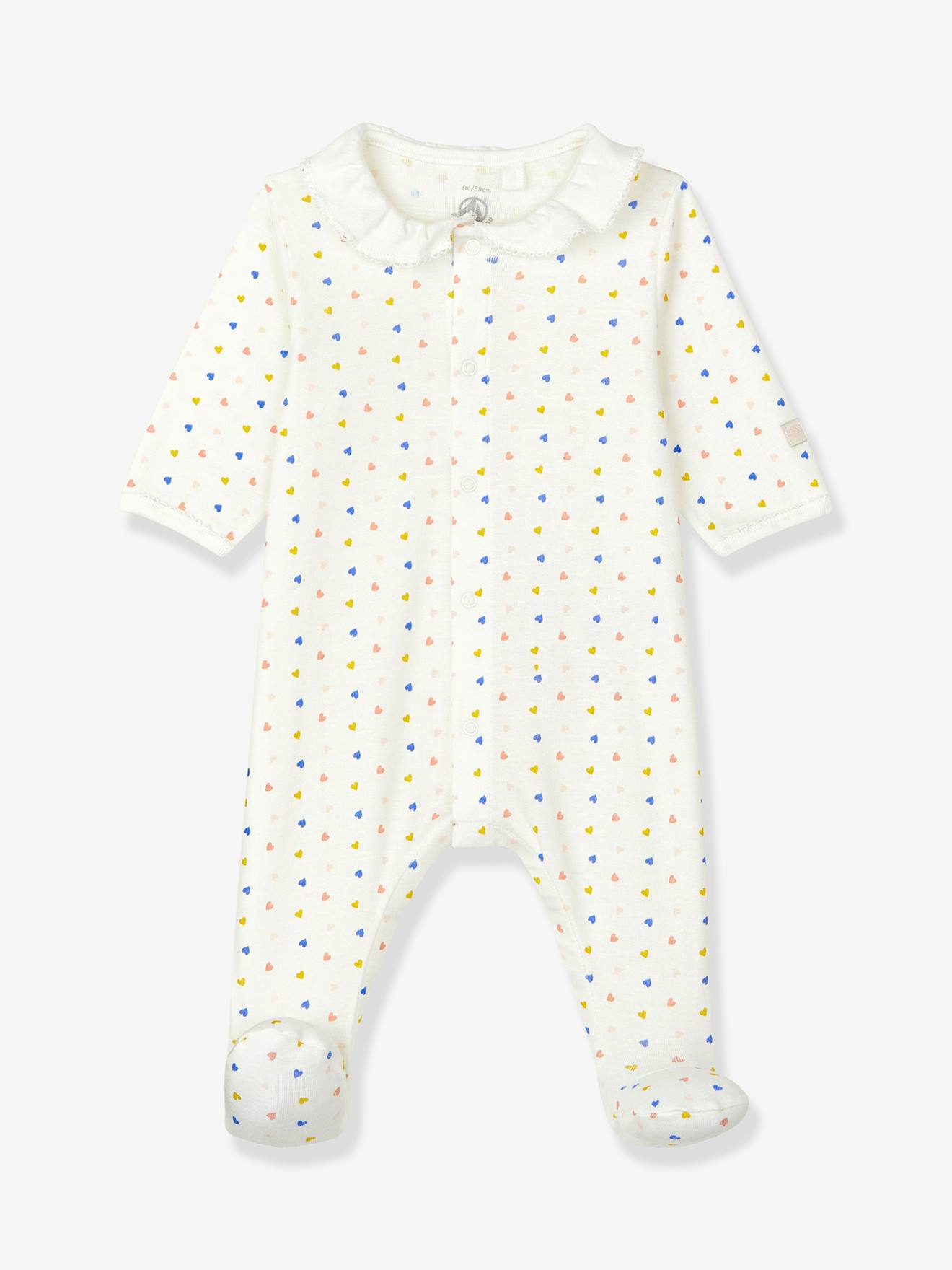 Macacão infantil PETIT BATEAU em algodão orgânico, branco claro com estampa.
