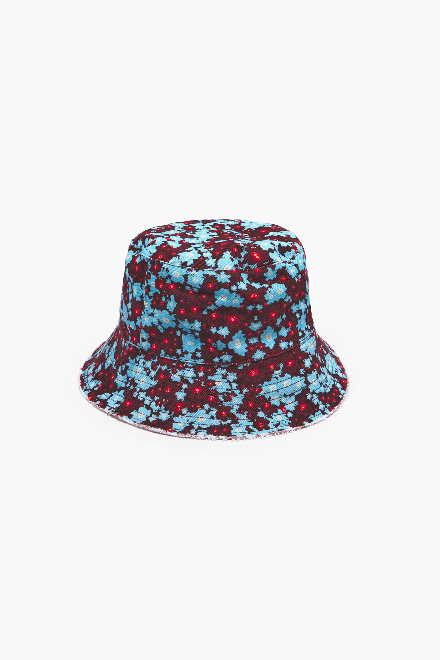 Chapéu bucket de algodão com estampa floral azul vibrante.