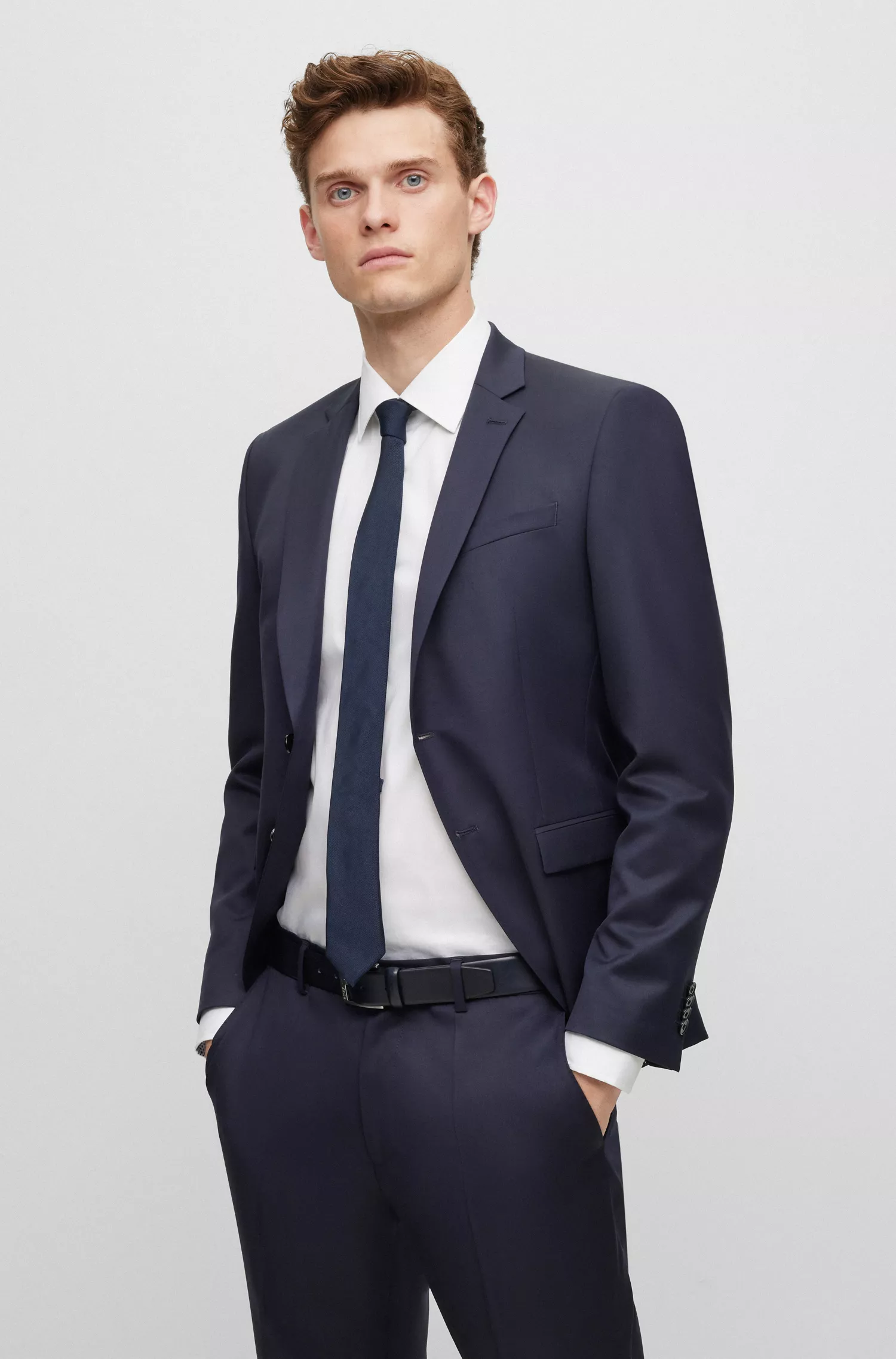 Jaqueta BOSS preta, extra slim fit, em sarja de lã virgem.