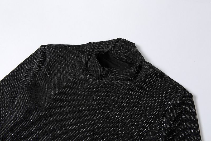 Oonnukal - Glitterjumpsuit met lange mouwen