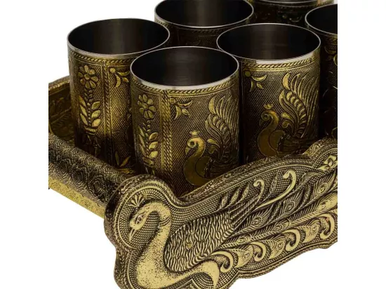 Plateau en métal repoussé doré 25x13x6h