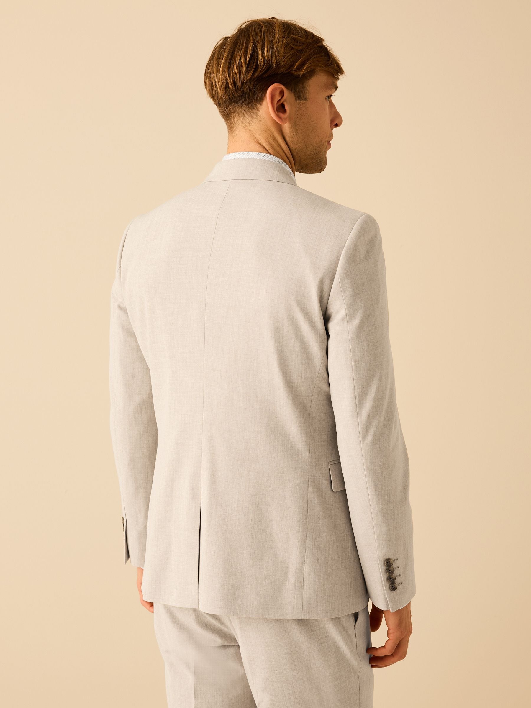 Pastelgeel - Slim Fit - Meegevend stretchkostuumjasje