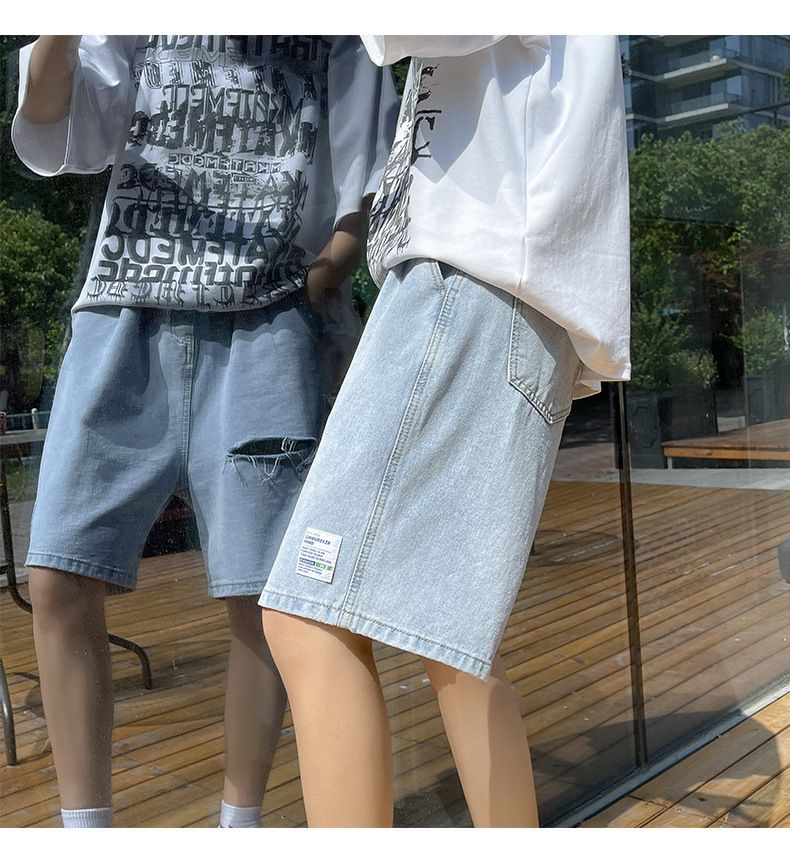 POSI - Uitgesneden denim shorts