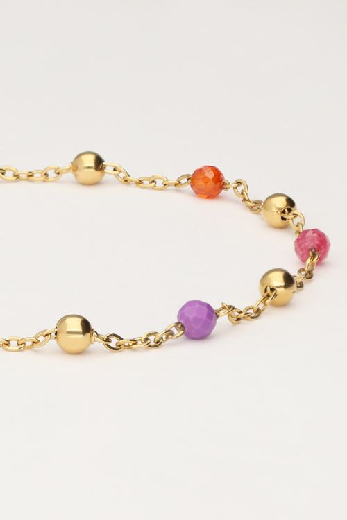 Armband met roze en paarse kralen