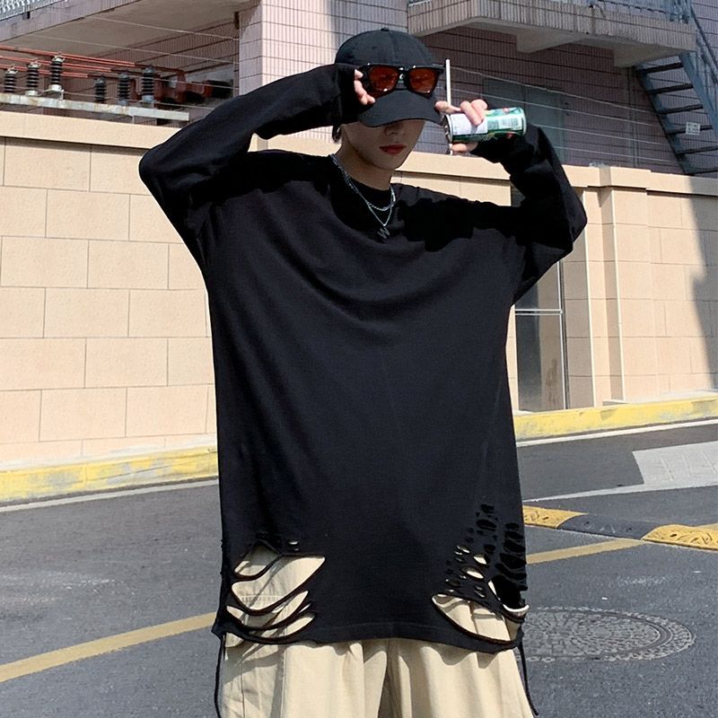 Whyessa - Versleten oversized top met lange mouwen