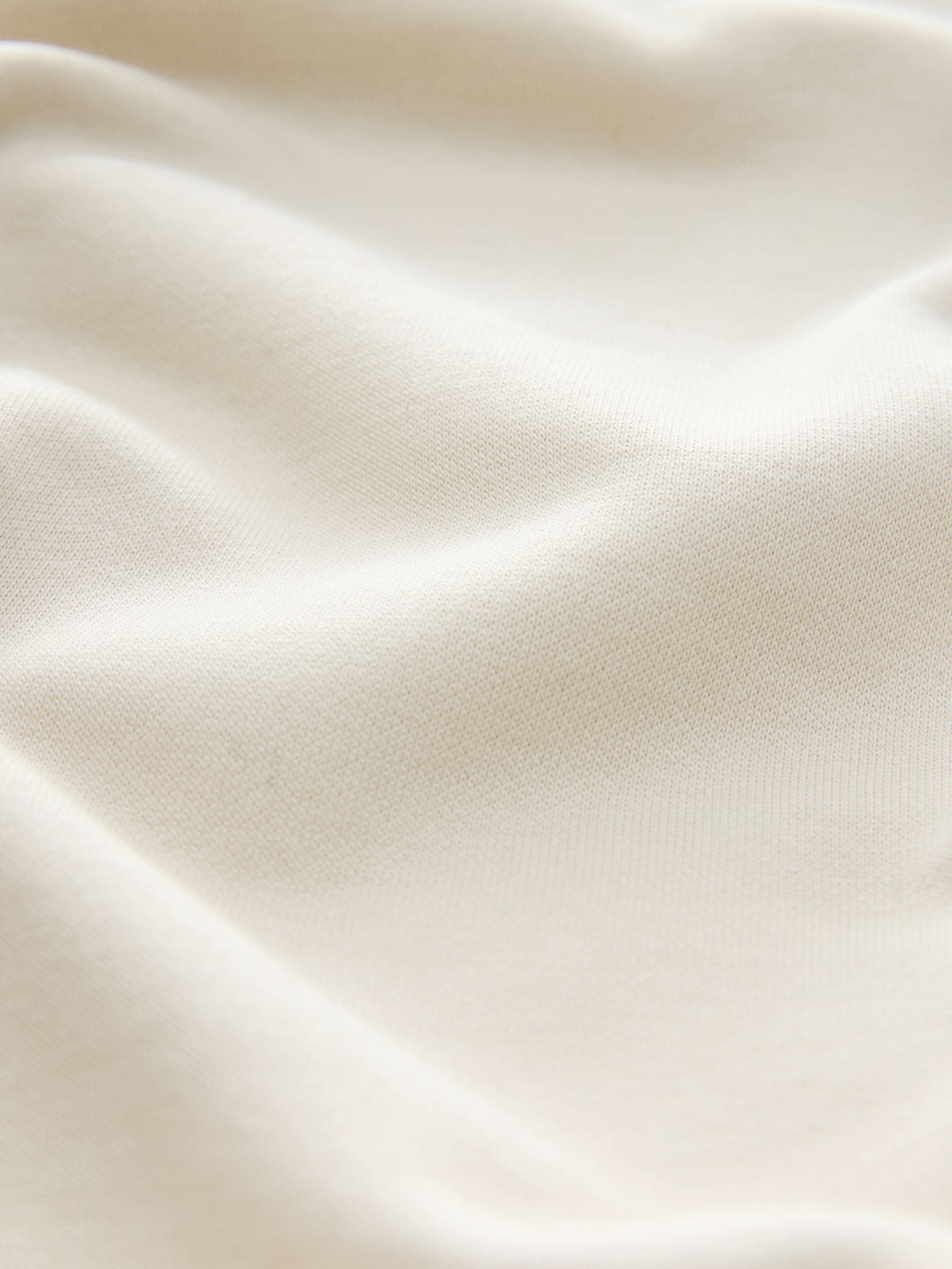 Pastelgeel - self. joggingbroek met wijde pijpen