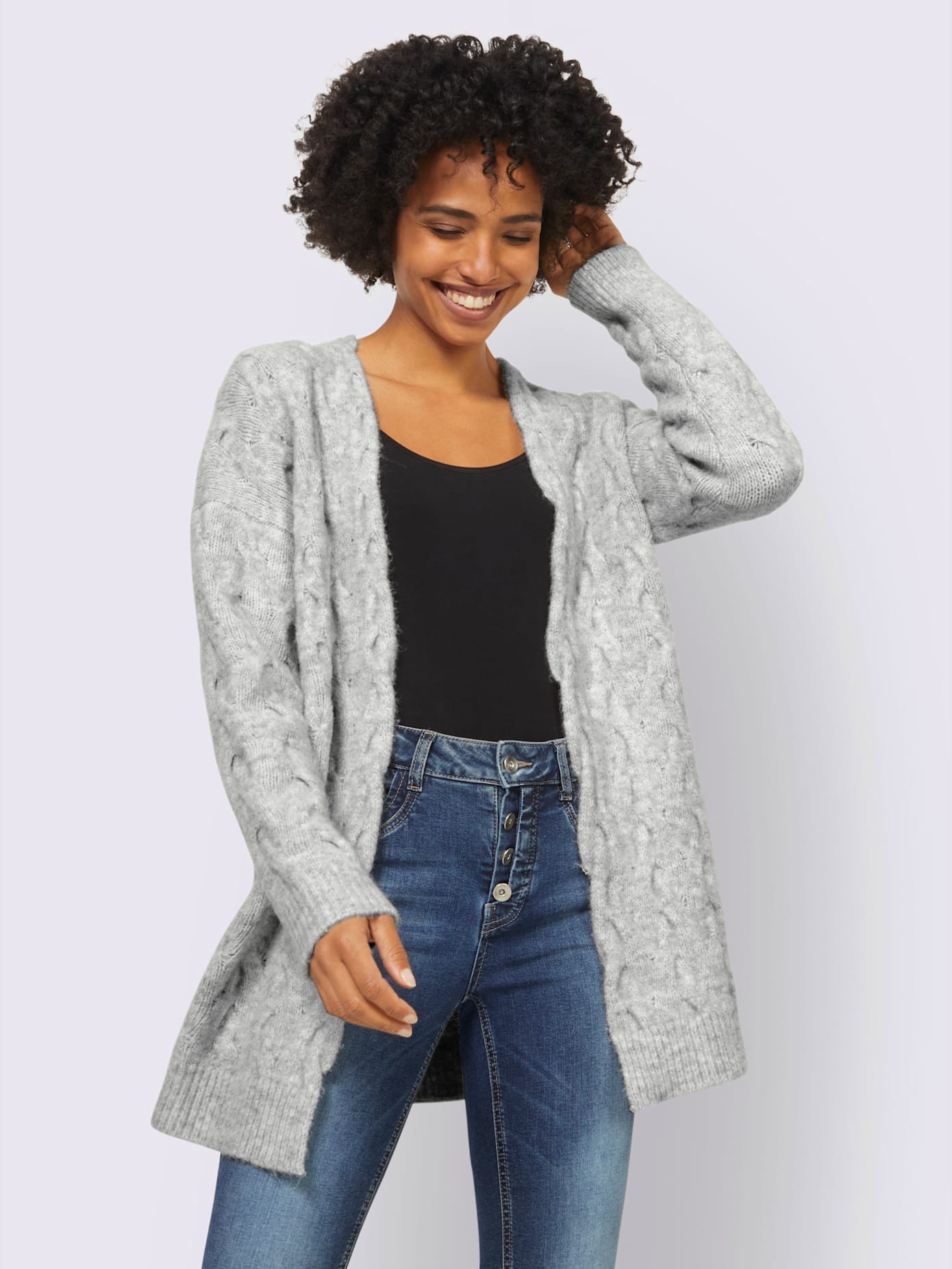 Veste en tricot superbe motif torsadé