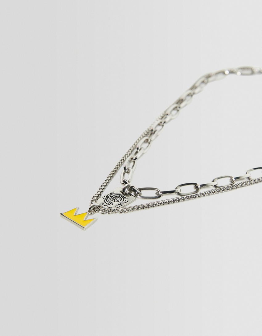 Conjunto de 2 colares com pingentes de Jean-Michel Basquiat