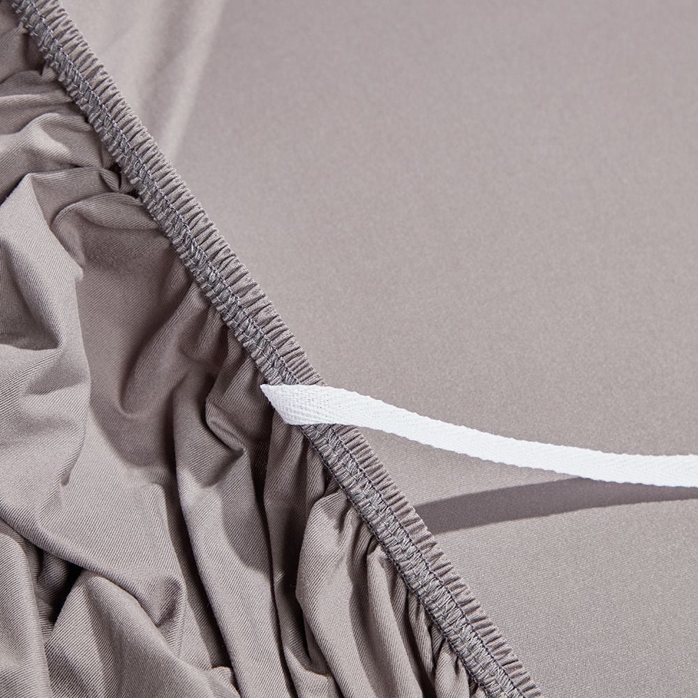 Protège canapé extensible 3 places uni gris 195 à 230 cm