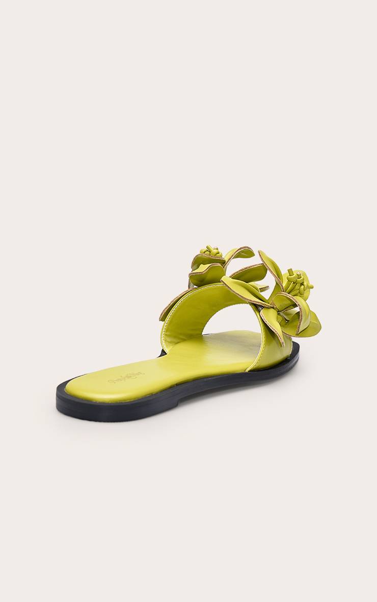 Chartreuse Sandale Plate En Synthétiquecuir Avec Détail Fleur
