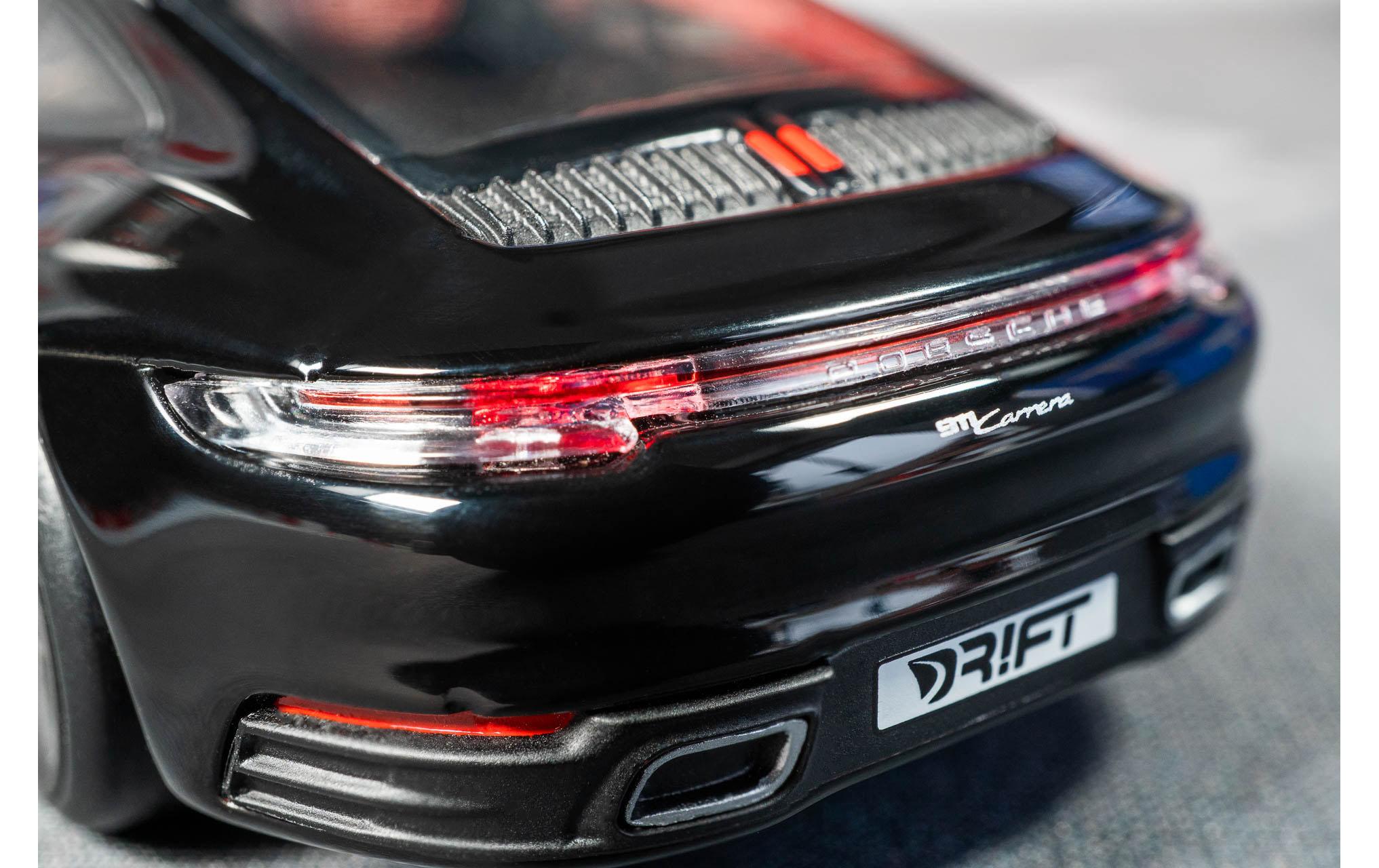DR!FT Racer Porsche 911 Carrera Schwarz, 1:43<br>Appgesteuertes Drift Auto im Massstab 1:43