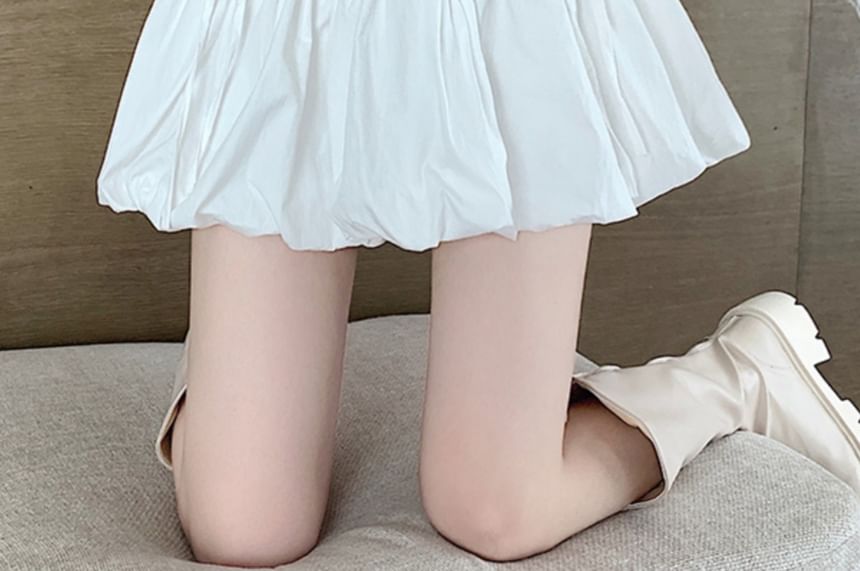 Pinatra - Hoge taille effen mini A-lijn skort