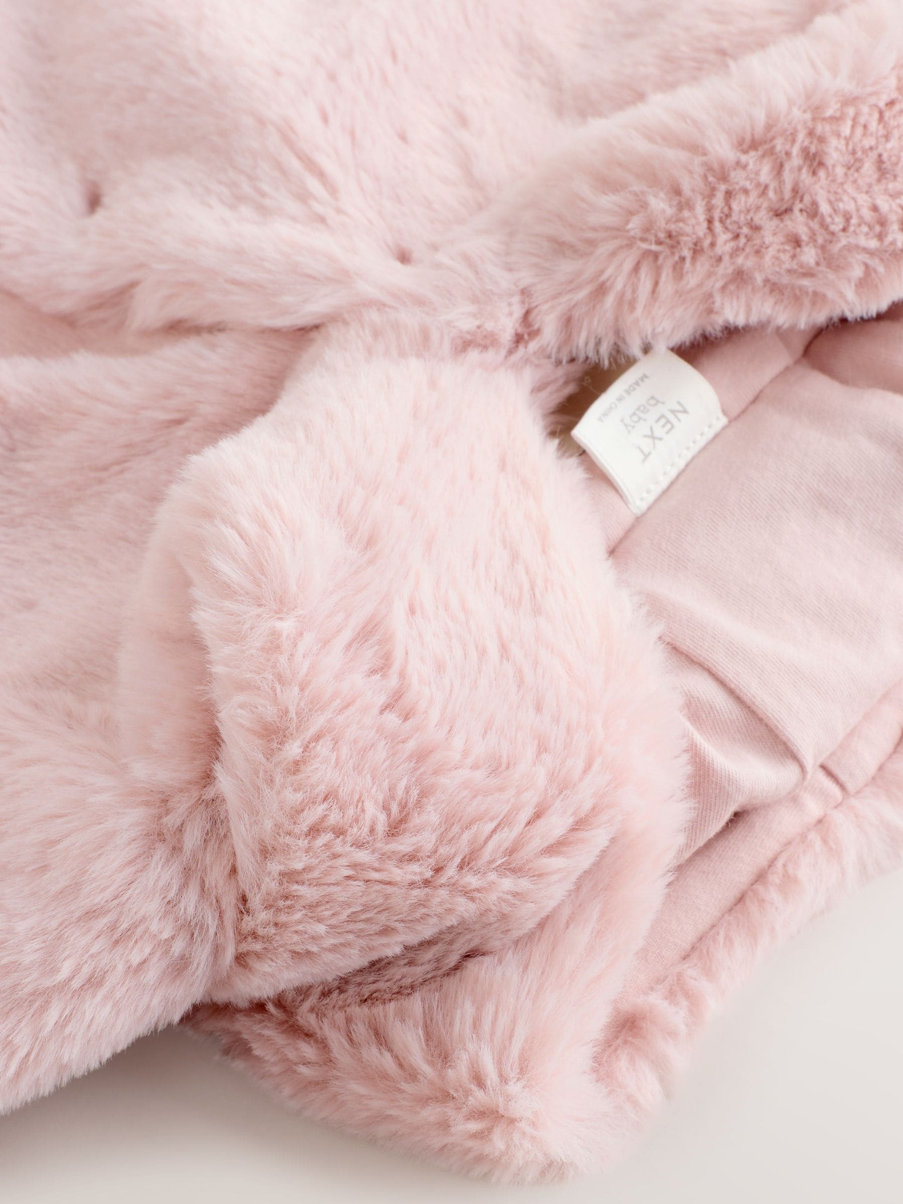 Roze - Babyjack met capuchon van imitatiebont (0mnd -2jr)