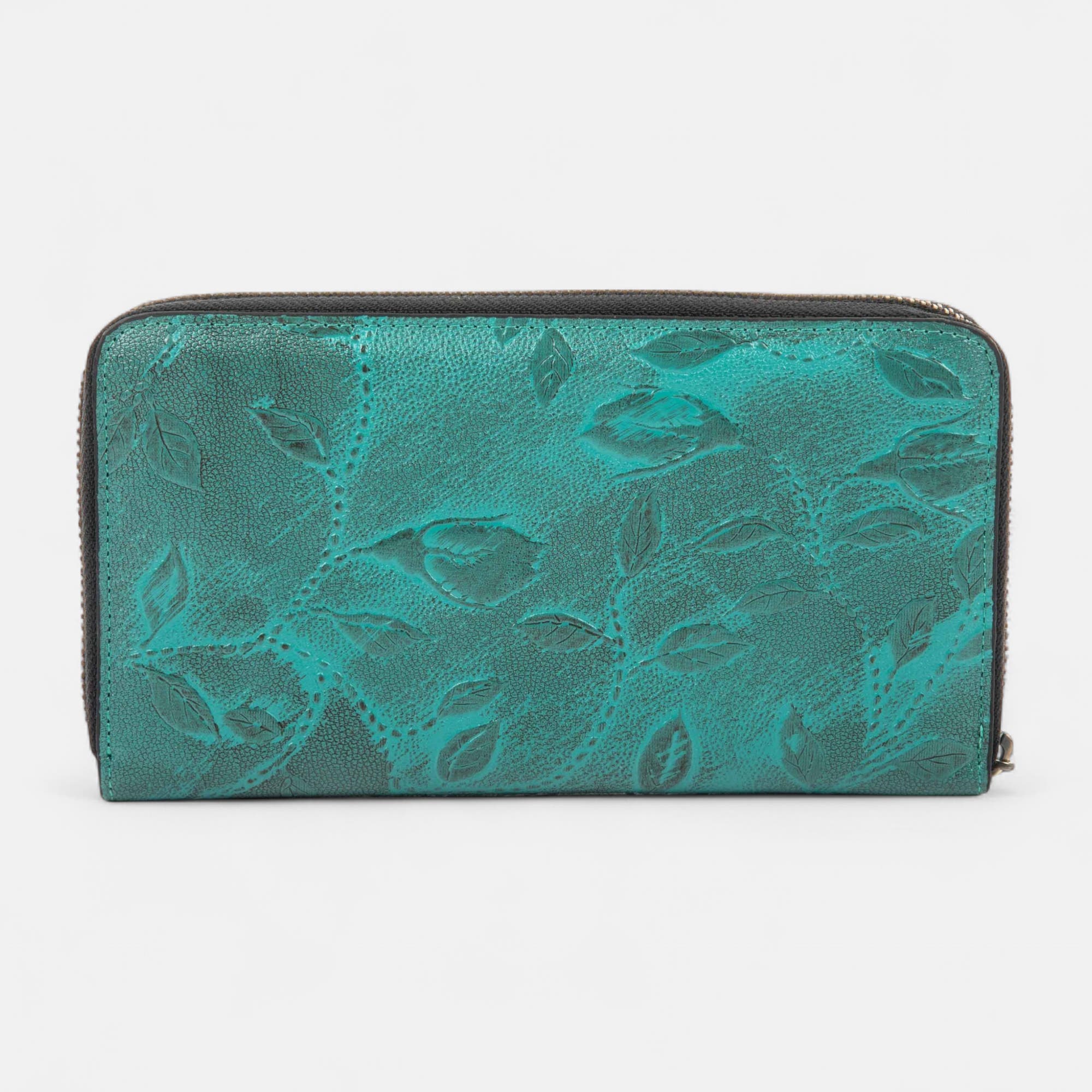 Petite maroquinerie en cuir turquoise