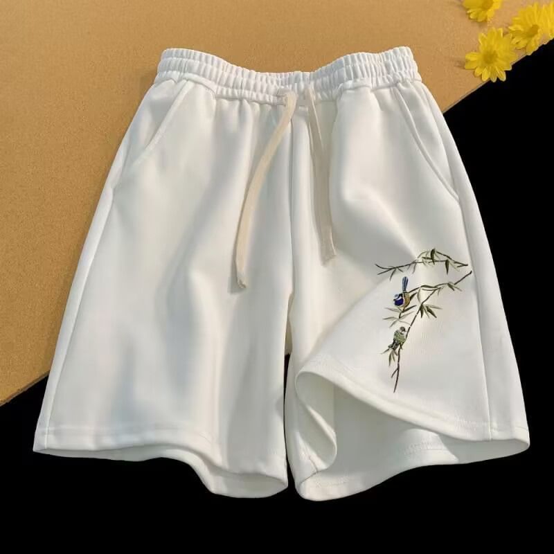 Cowpow - Zweetshorts met trekkoord en geborduurde vogels