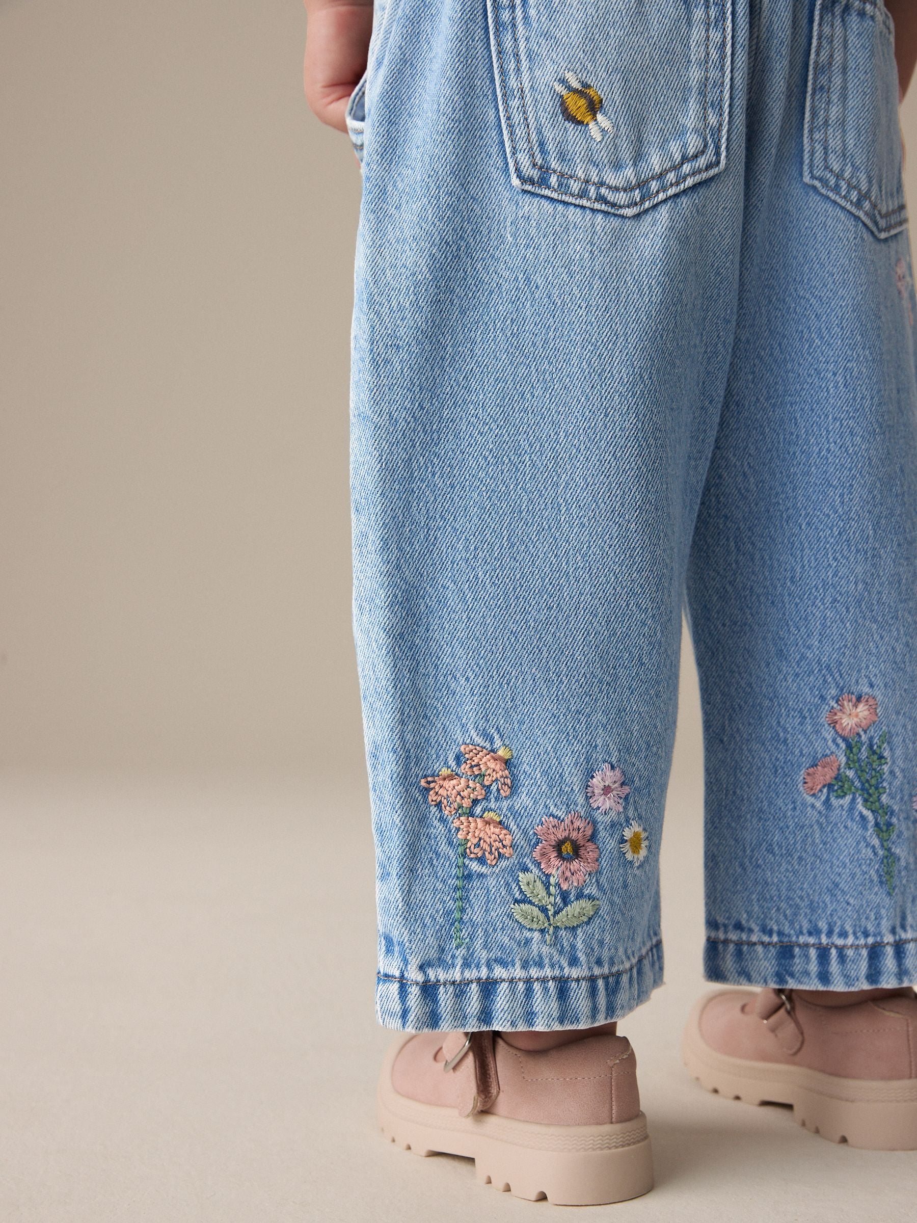 Denim - Jeans met toelopende pijpen en geborduurde bloemenprint (3mnd-7jr)