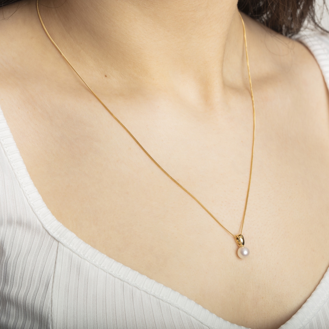 Anhänger 750/18 K Gelbgold mit Süsswasser-Kulturperle Ø 7.0mm