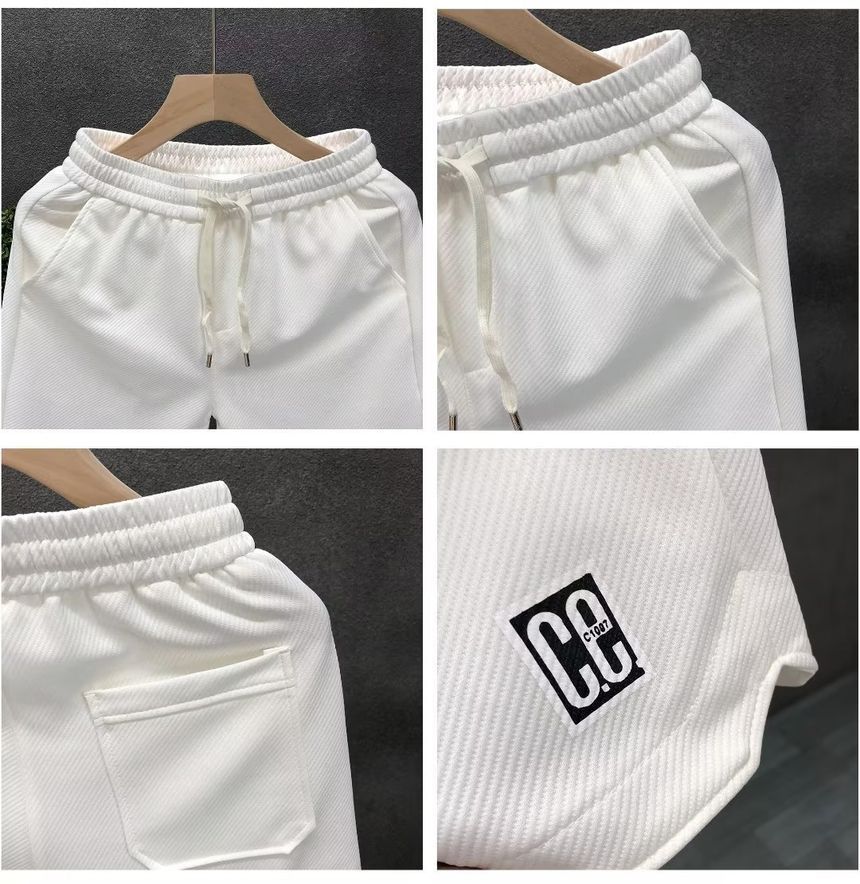 Mokoloko - Sweatshorts met trekkoord en letterprint