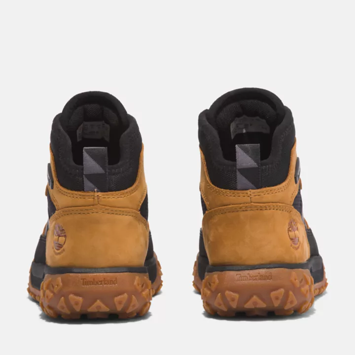Bota impermeável GreenStride Motion 6 para jovens, na cor amarela.