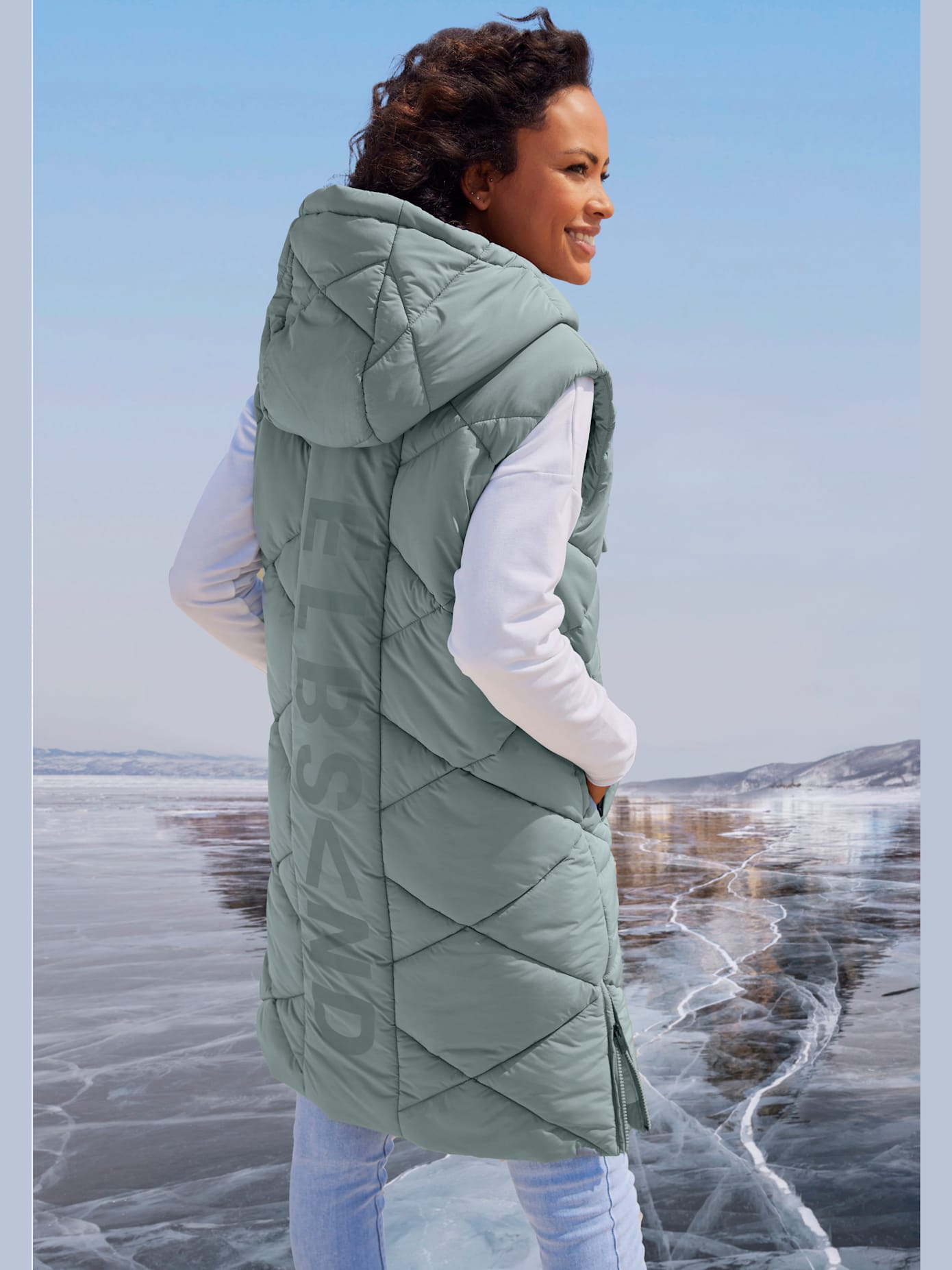 Gilet matelassé doublé avec capuche réglable