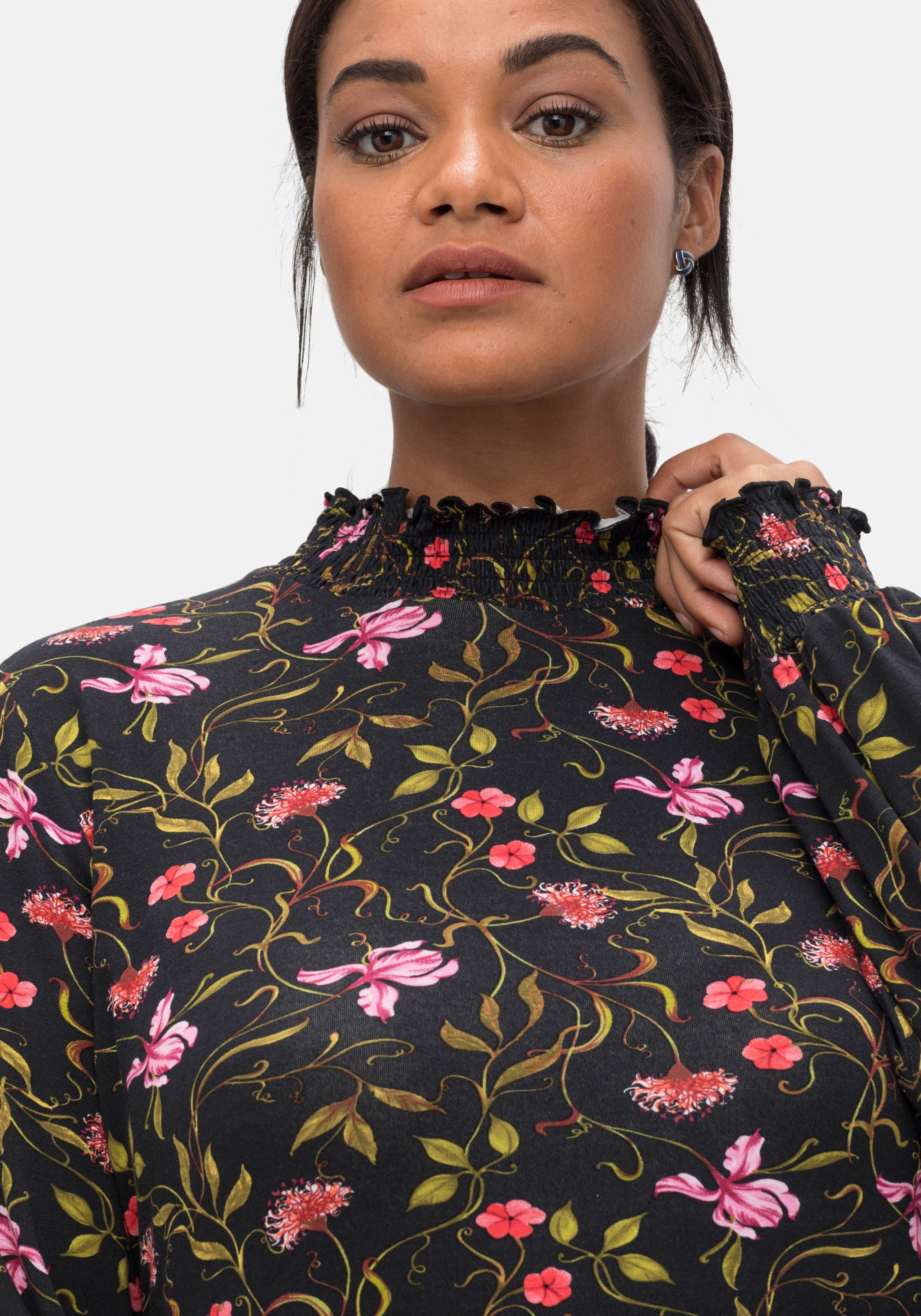 Langarmshirt mit Smokdetails und Volant am Saum