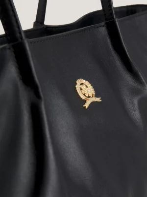 Bolsa de couro com placa de brasão