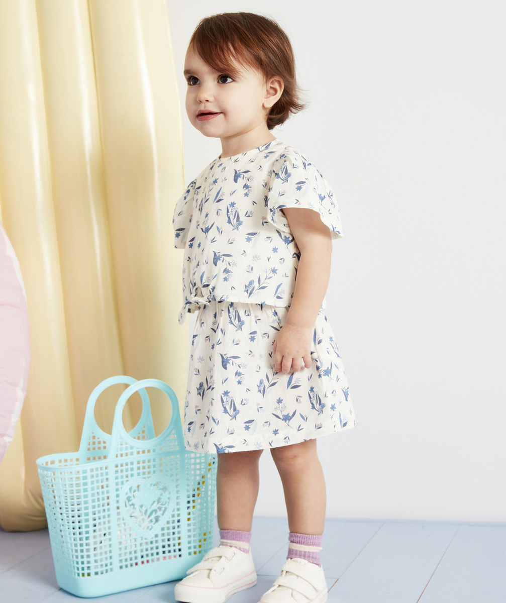 ROBE BÉBÉ FILLE EN COTON AVEC EMPIÈCEMENT ET IMPRIMÉ