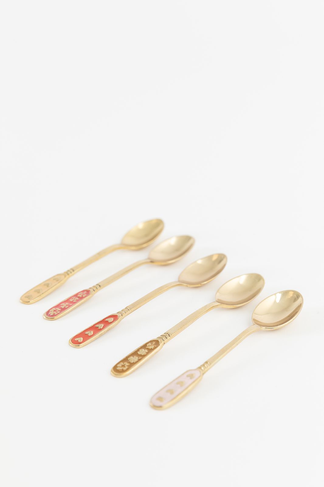 Goudkleurige theelepels met vintage details