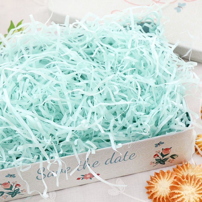 Bakebask - Decoraties van raffia versnipperd papier