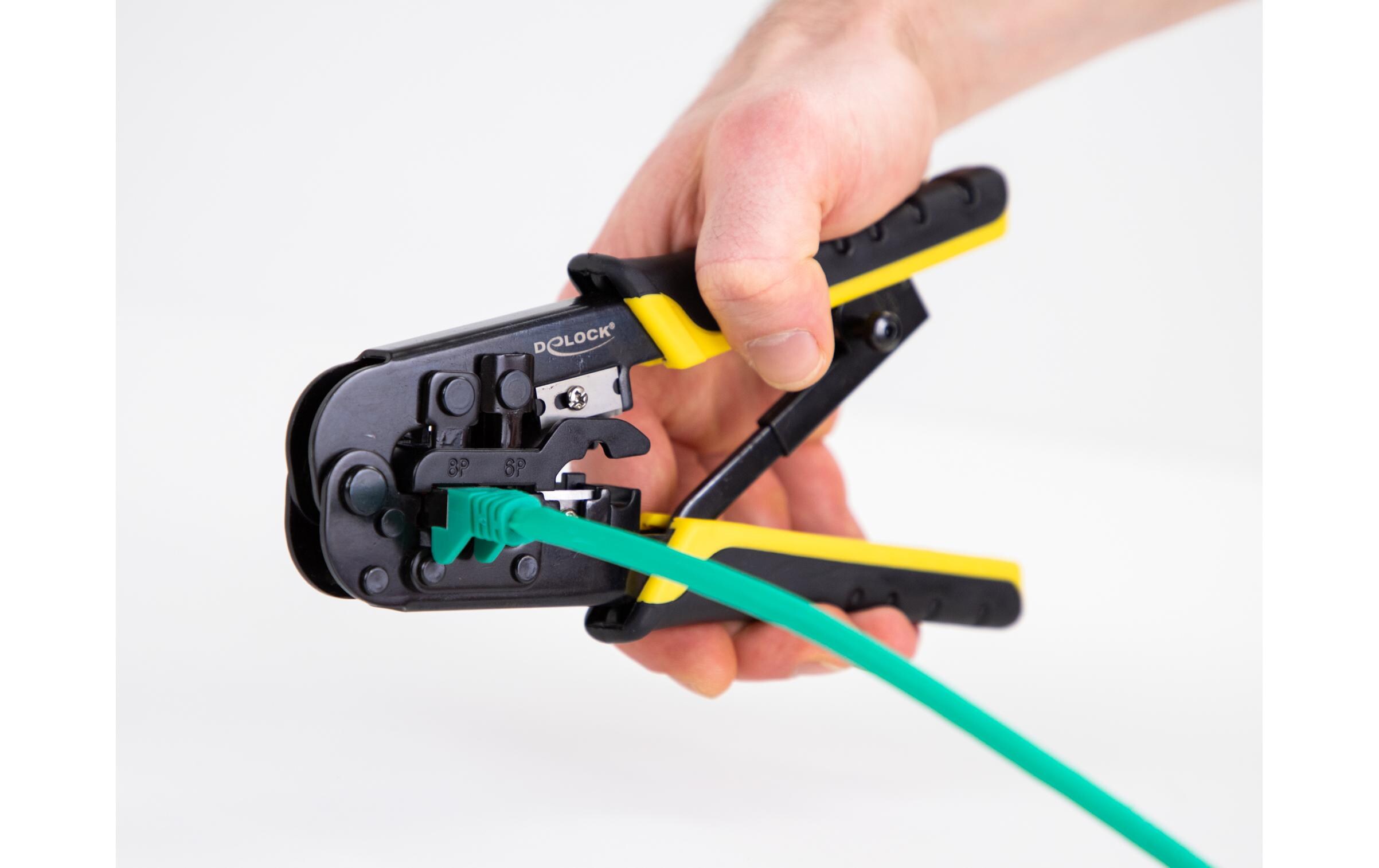 Crimpzange Universell mit AbisoliererDelock Universelle Crimpzange mit Abisolierer für 8P (RJ45), 6P (RJ12/11) oder 4P Stecker