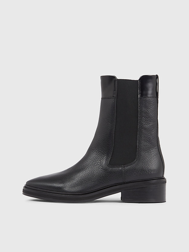 botas de couro até o tornozelo