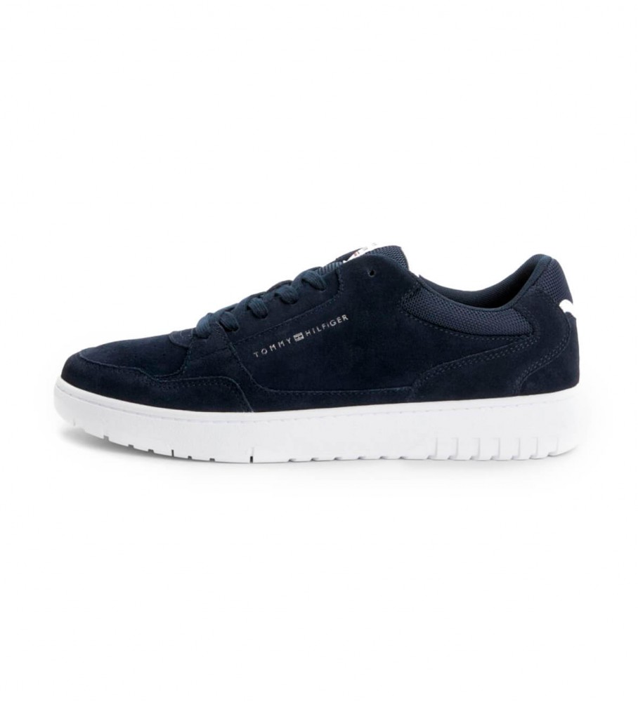 Tênis Tommy Hilfiger azul-marinho de camurça com sola de borracha.