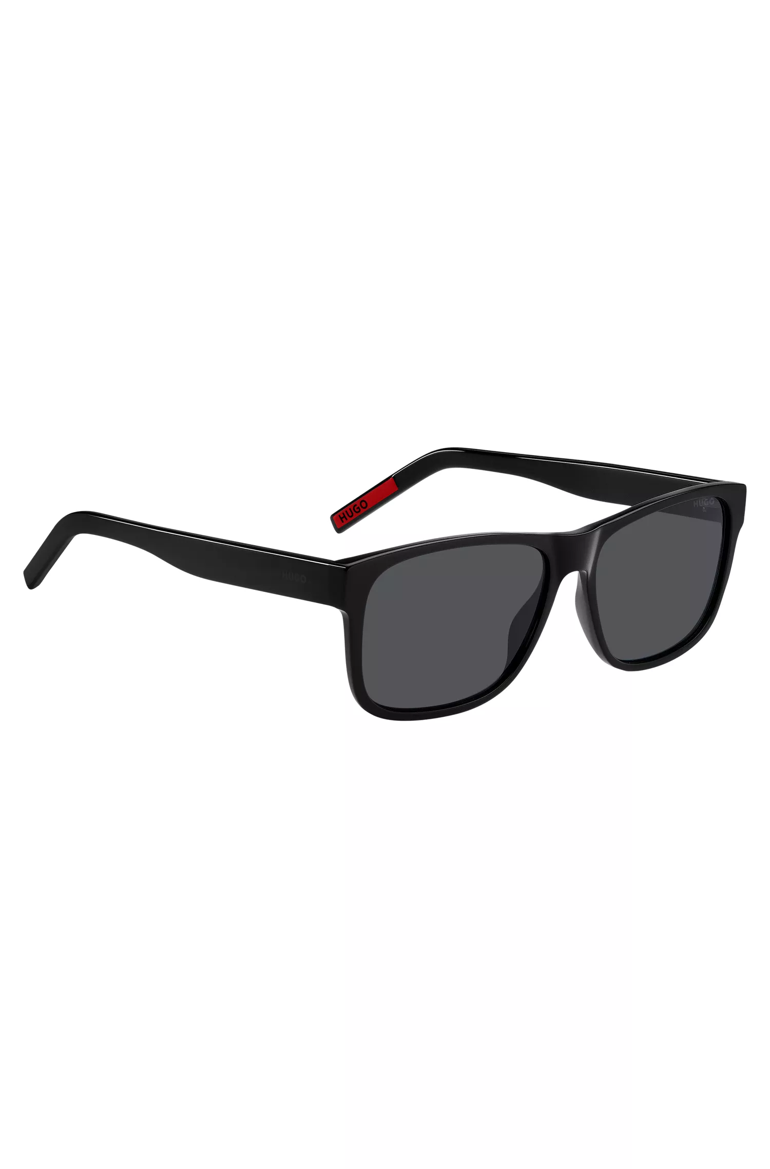 Óculos de sol HUGO em acetato vermelho e preto com hastes personalizadas.