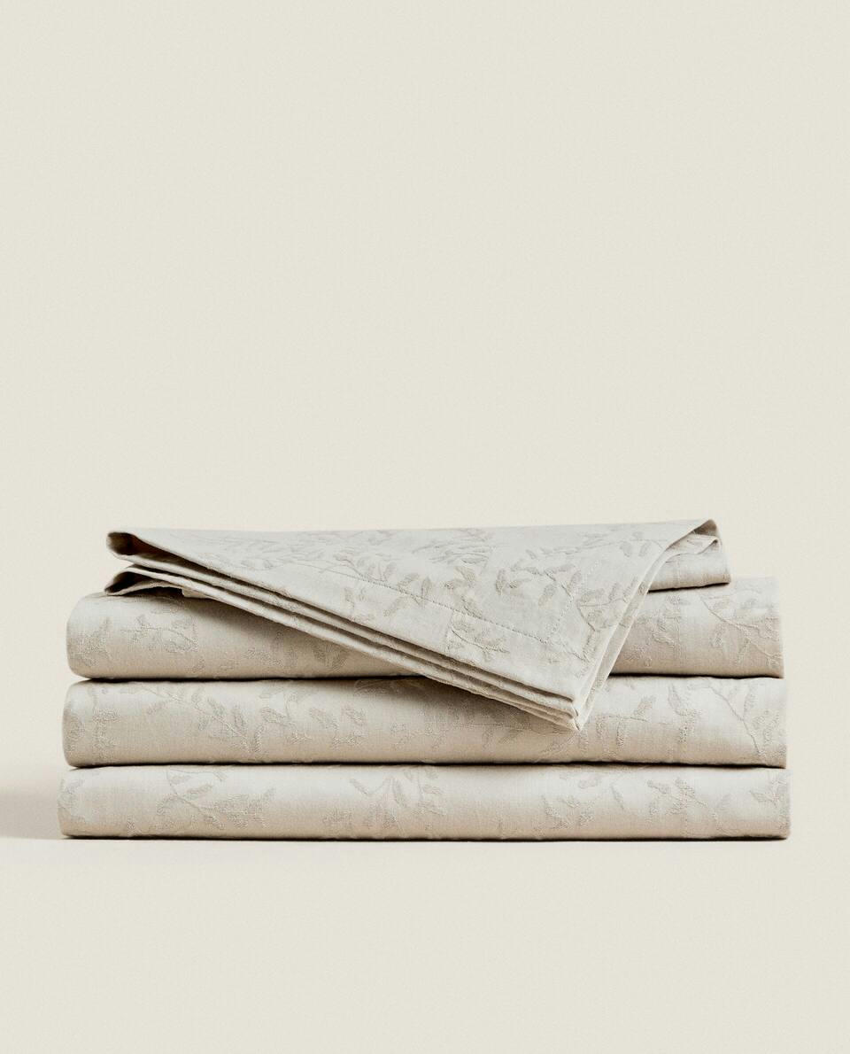 TOALHA DE MESA COM FOLHAS DE JACQUARD