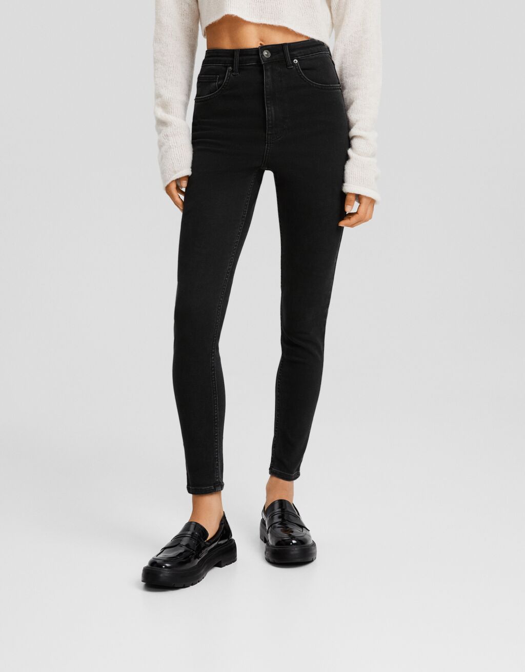 calça jeans skinny de cintura super alta