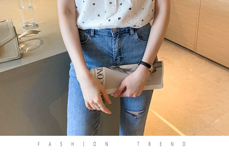 Tel tot 10 - Blouse met korte mouwen en strikhals en hartjesprint