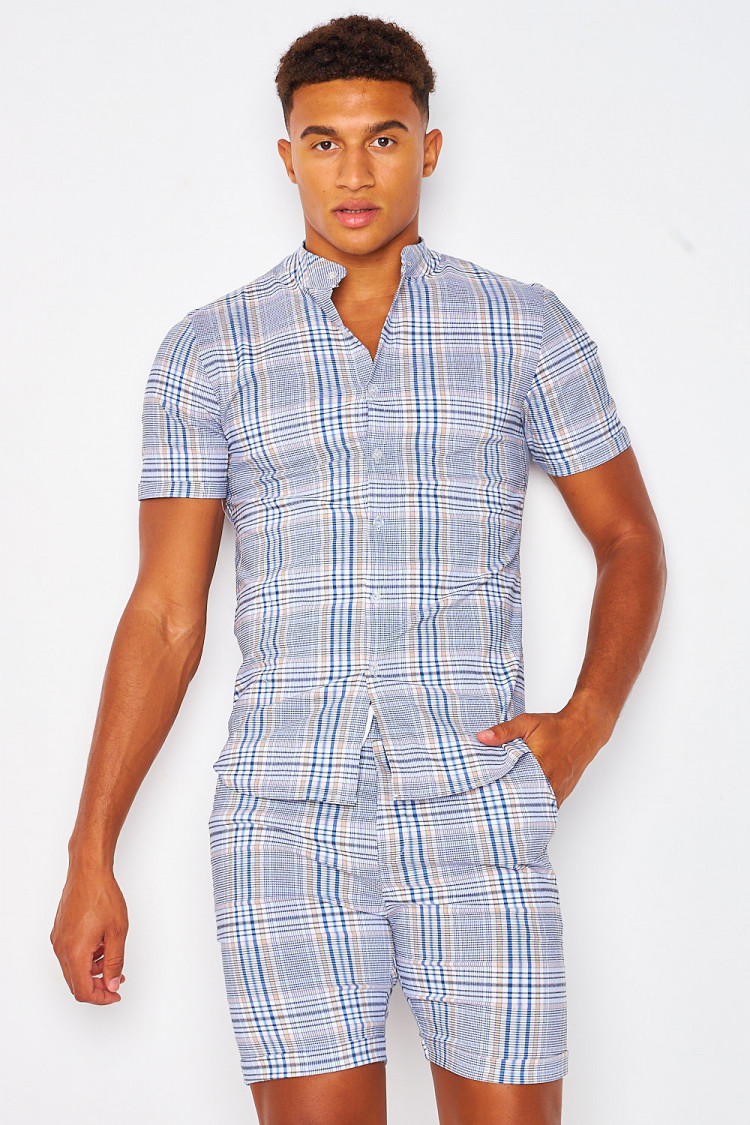 Chemise blanche à carreaux bleus et beiges