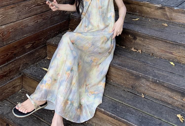 Trendycas - Mouwloze V-hals maxi-A-lijn jurk met bloemenprint