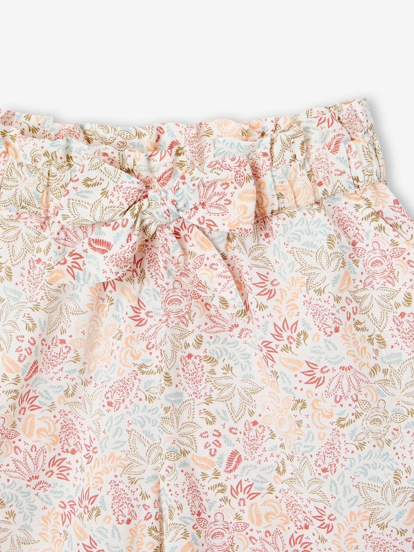Conjunto feminino: regata e shorts com estampa exótica de rosa antigo.