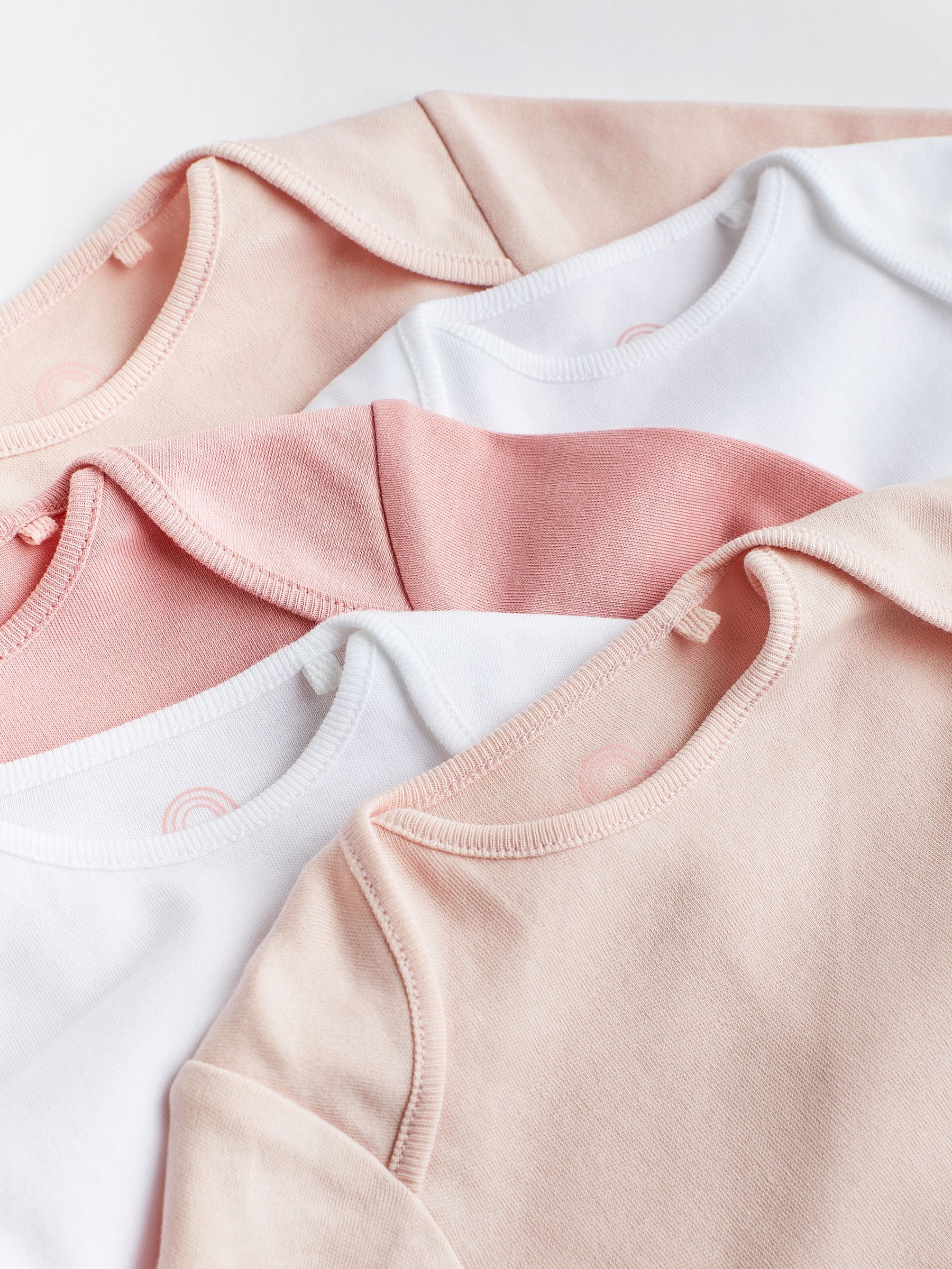 Roze/wit - Onmisbare rompertjes met lange mouwen