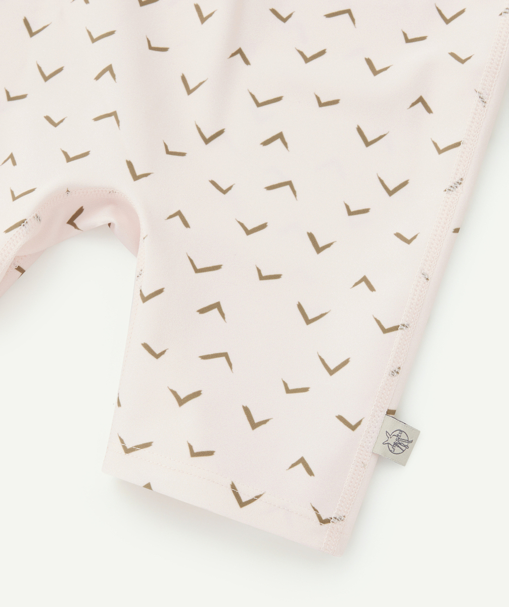 LASSIGCOMBINAISON ANTI-UV BÉBÉ ROSE AVEC IMPRIMÉ KAKI