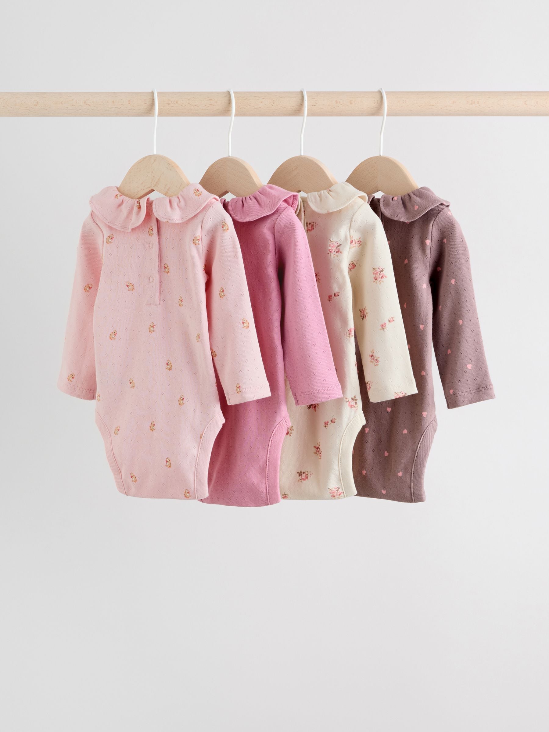 Roze/crème/bruin met fijne bloemetjesprint - Verpakking van 4 babyrompers met lange mouwen en ruches (0mnd-2jr)