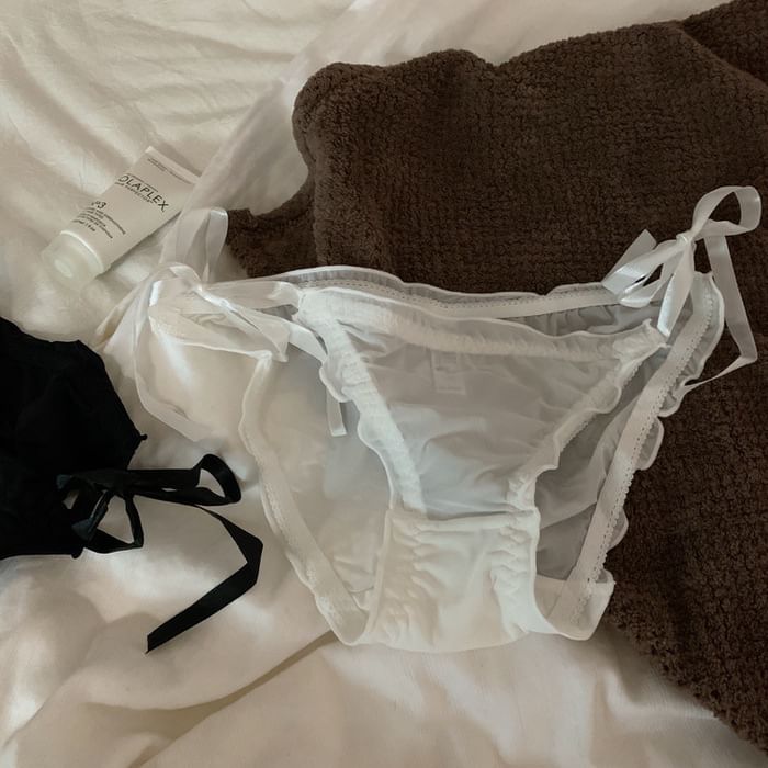 Fenmo - Effen mesh panty met knoopsluiting aan de zijkant