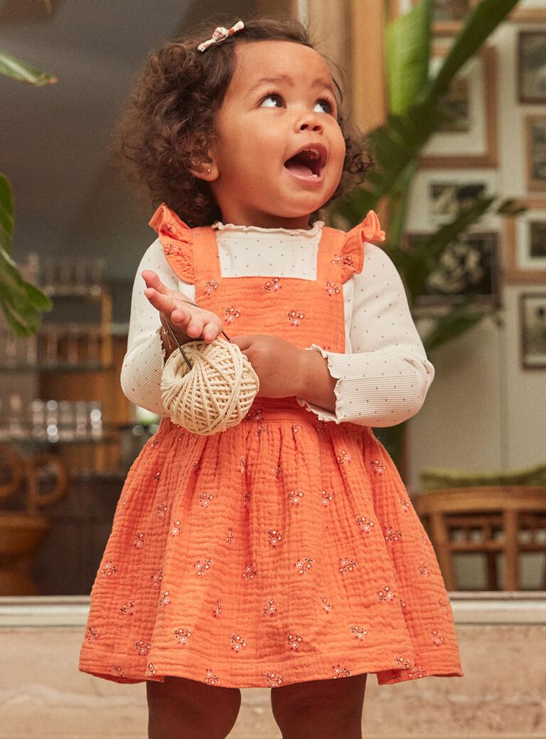 Robe chasuble orange en gaze de coton à imprimé fleuri