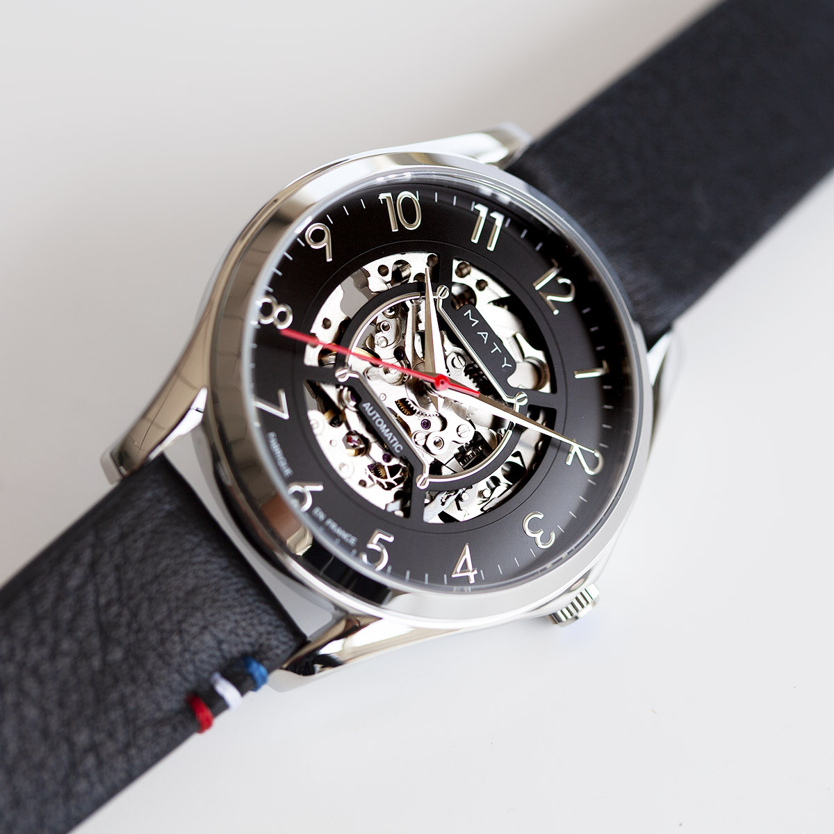 Montre homme squelette automatique acier bracelet cuir noir