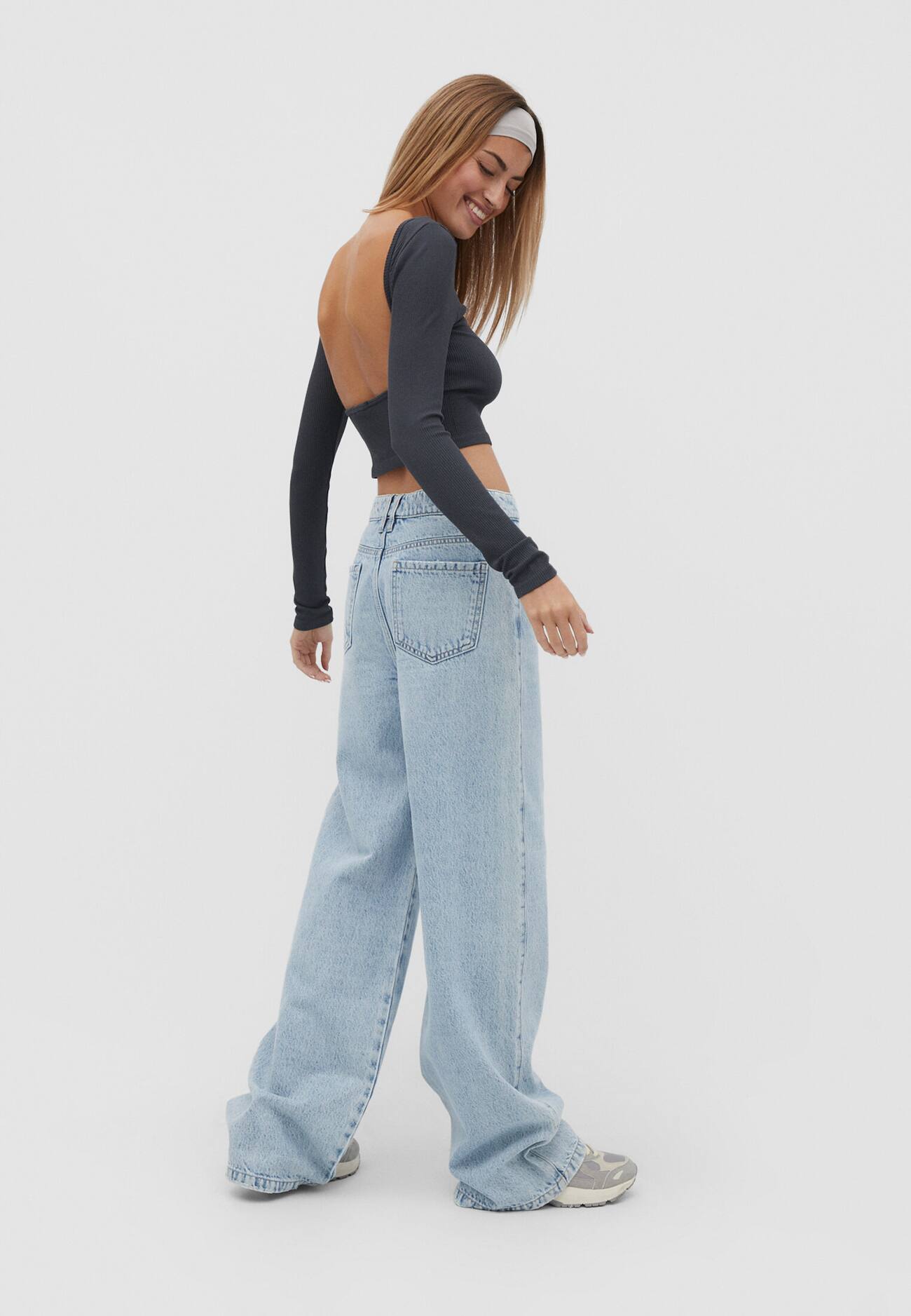 calças jeans de perna larga