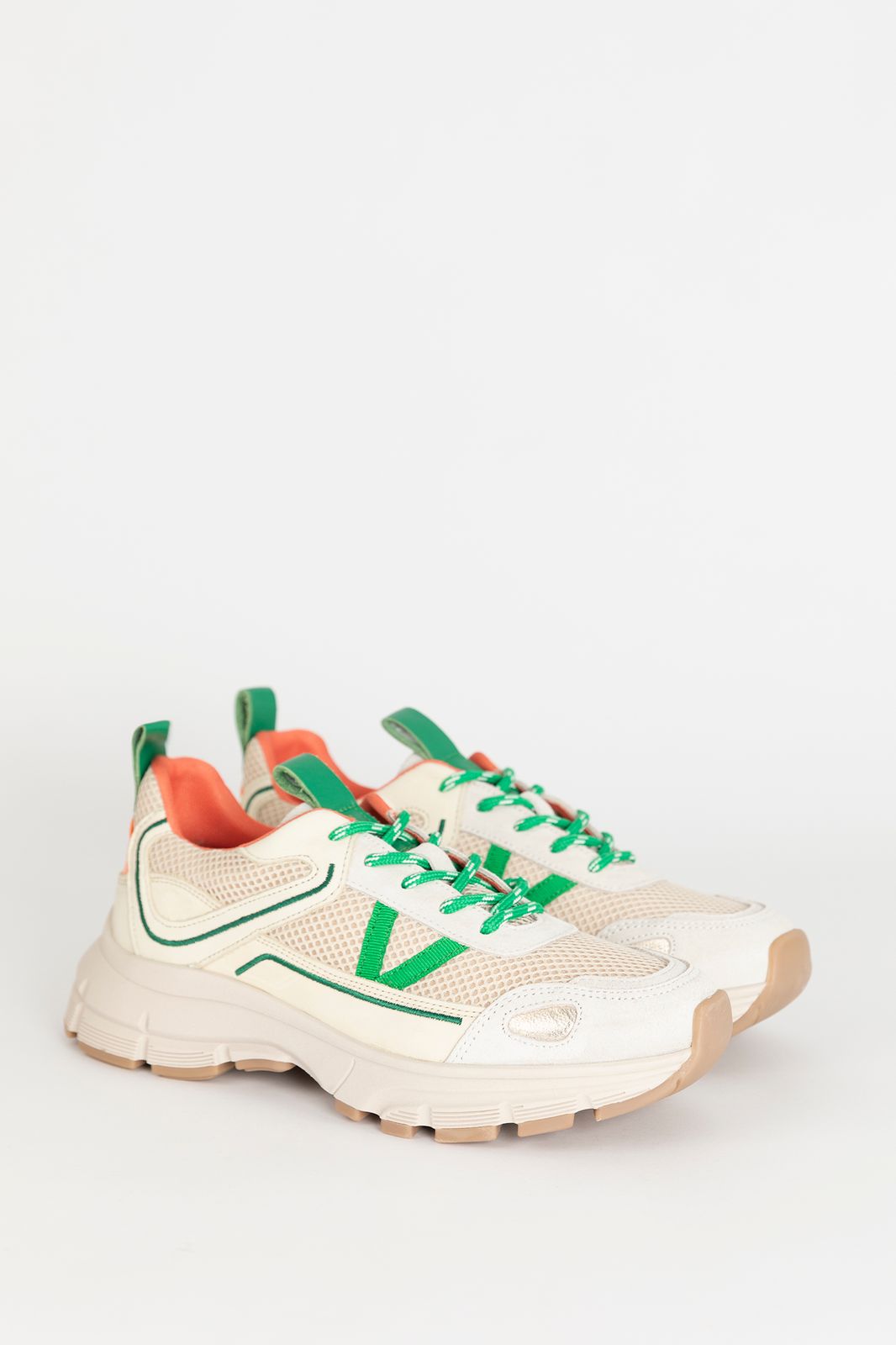 Witte sneakers met groene details