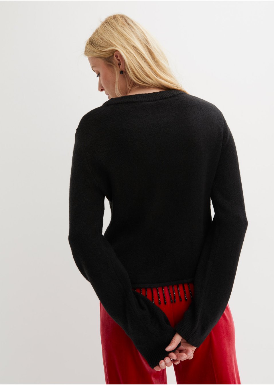 Pull avec franges perlées