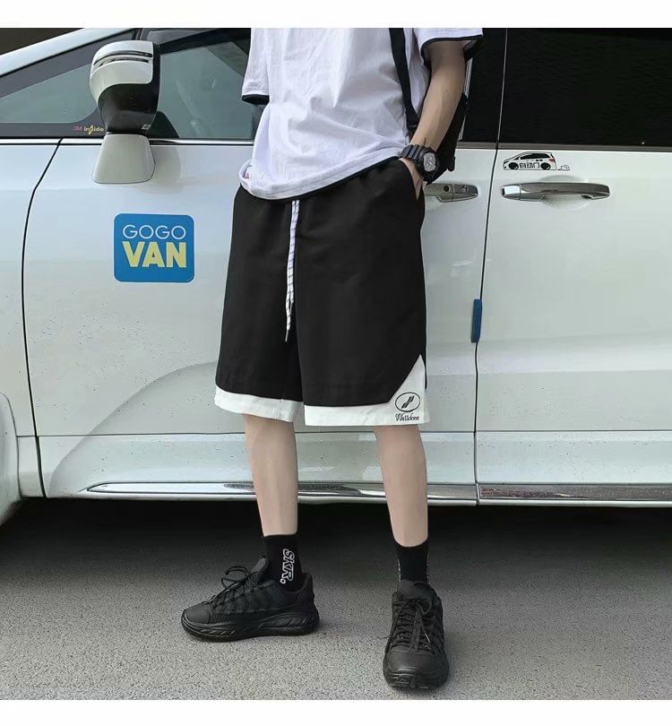 Macho - Tweekleurige shorts met wijde pijpen en trekkoord in de taille