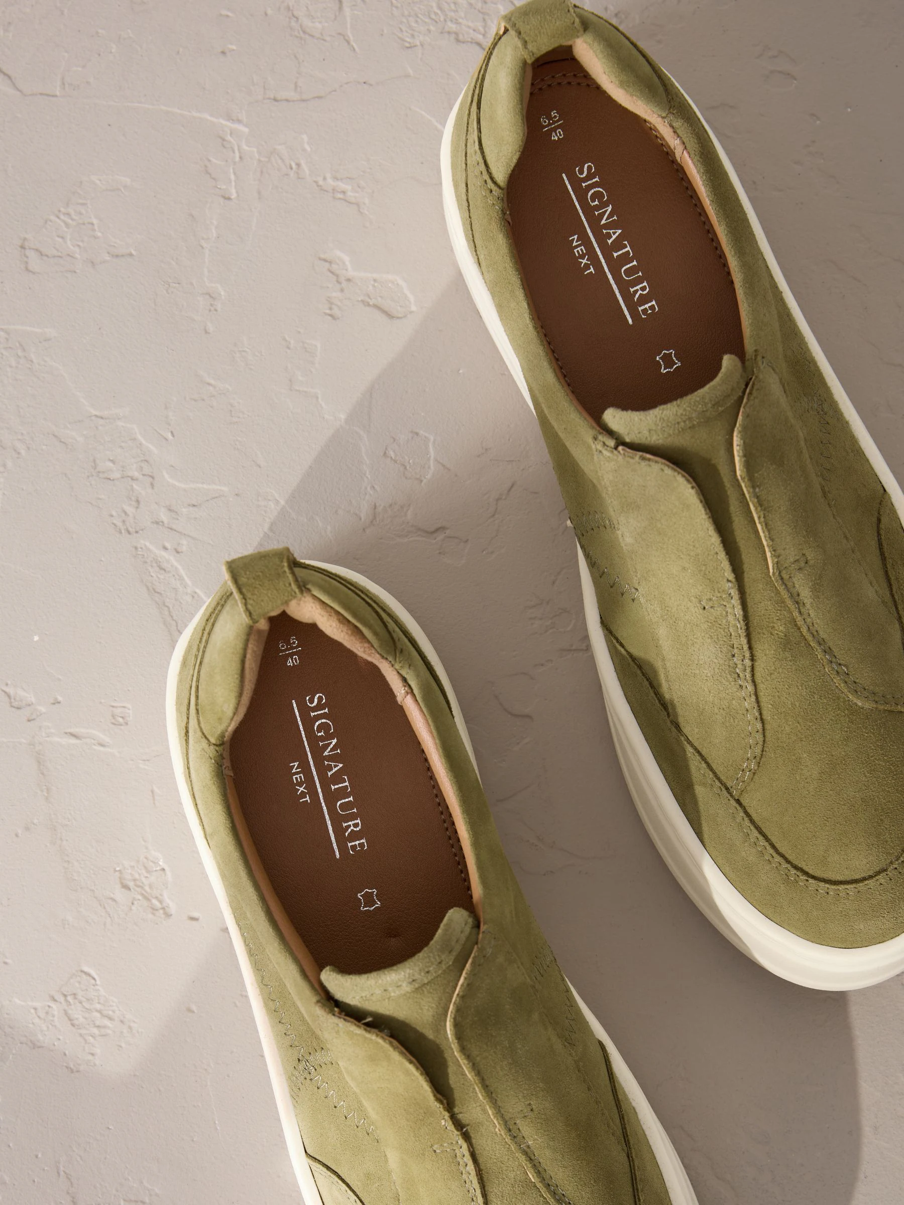 Kakigroen - Signature leren sneakers met dikke plateauzolen en sleehak